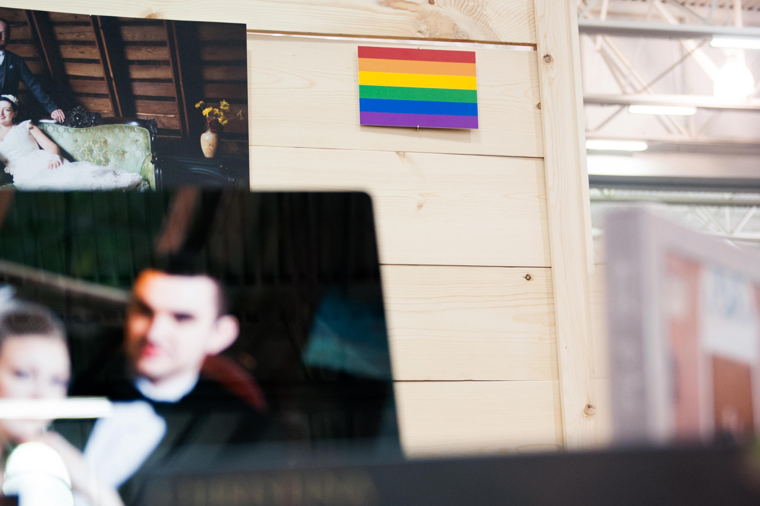 Firelily Photography Madison, WI 2017 Winter Bridal Show Booth | Same-Sex Wedding Photography: Rainbow flag: Love is love is love is love
