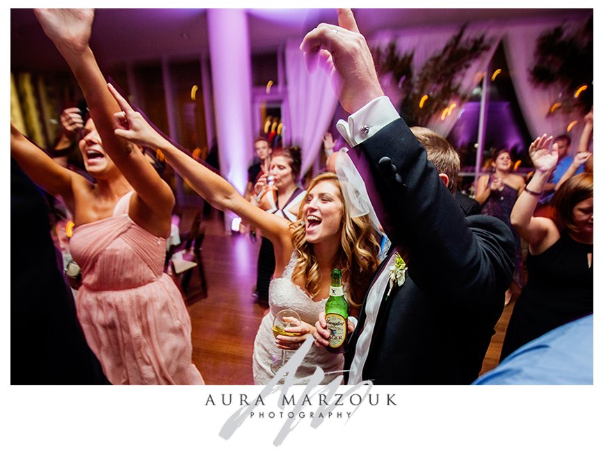 Wild dancing at Jessica and Chad's Mint Museum wedding in Charlotte. © Aura Marzouk Photography, Greensboro Wedding Photographer