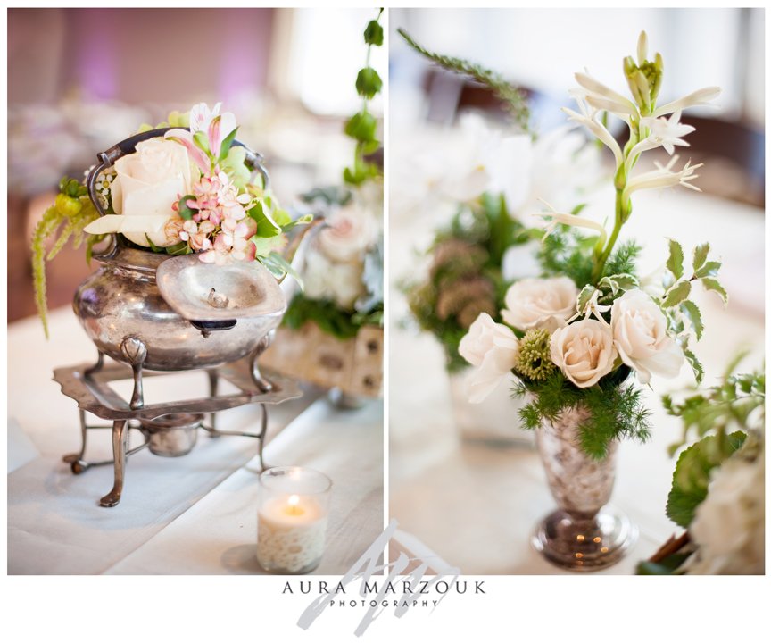 Beautiful soft pink rose centerpieces in tea kettles adorn this Mint Museum wedding. © Aura Marzouk Photography, Greensboro Wedding Photographer