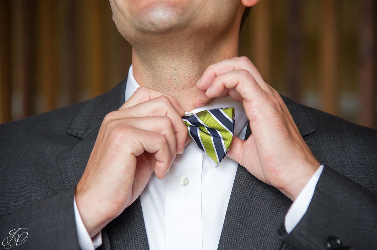 unique shot of groom and his bow tie