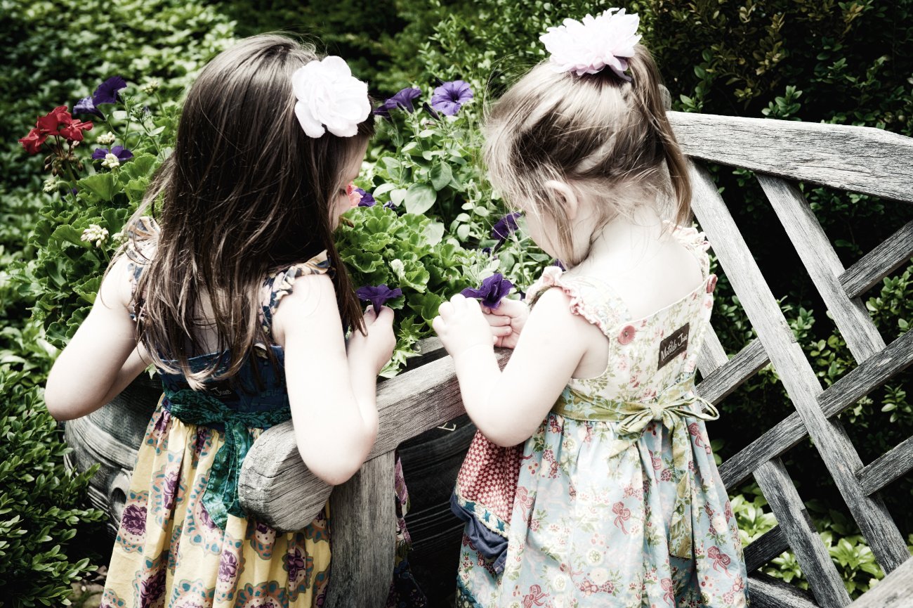 Peterson Children Portraits in Wisconsin - girls in garden
