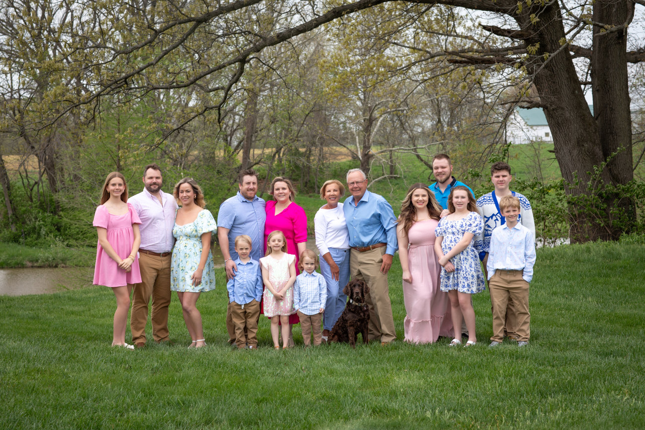 Large family group in grassy area