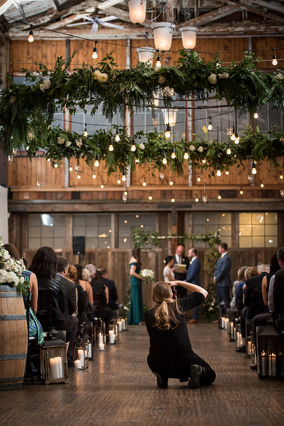 irene jones of IJ photo photographing a wedding ceremony