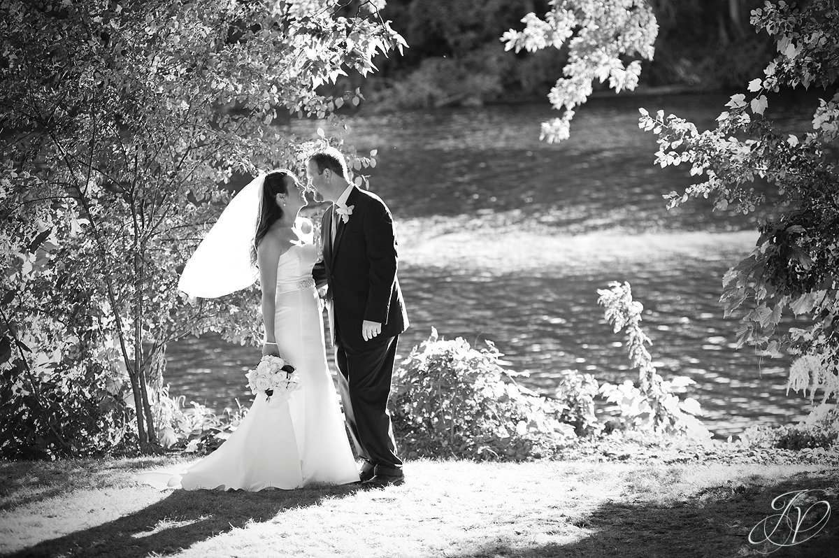 bride and groom next to the river, riverstone manor, bride and groom photo, schenectady wedding photographer