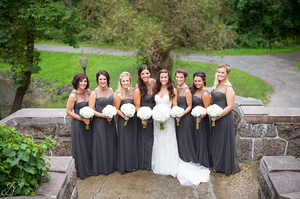 bride and bridesmaids in grey dresses