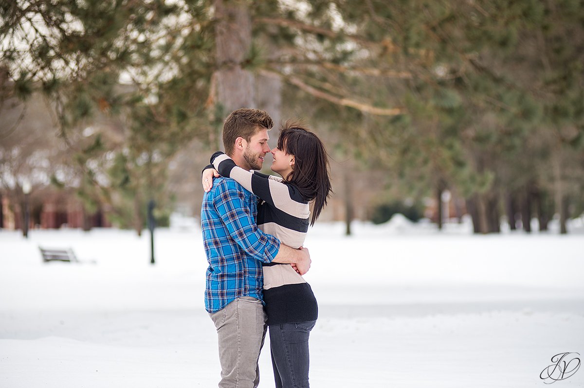 photo of engaged couple almost kissing