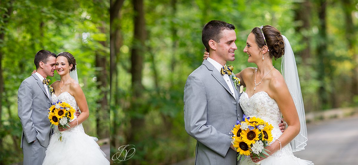 bride and groom on bridge walkway Timberlodge at Arrowhead Golf Club