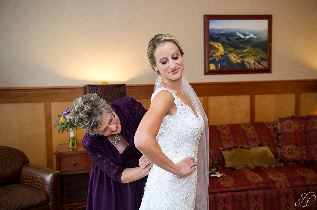 bride getting ready with mom