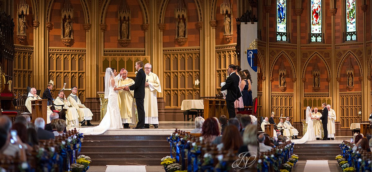 bride and groom during catholic church ceremony