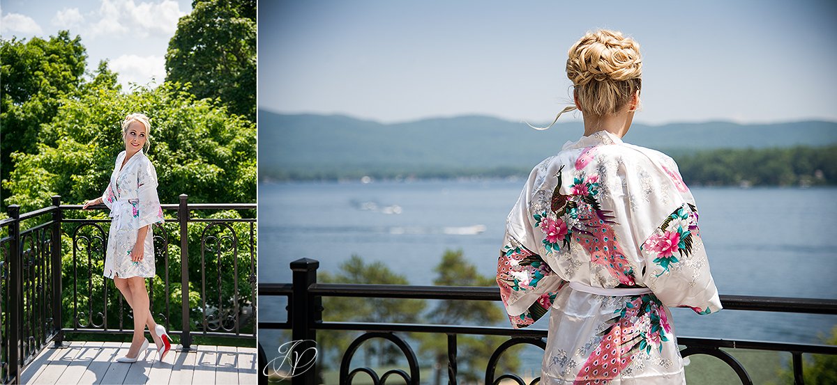 bride in getting ready robe looking out over Lake George