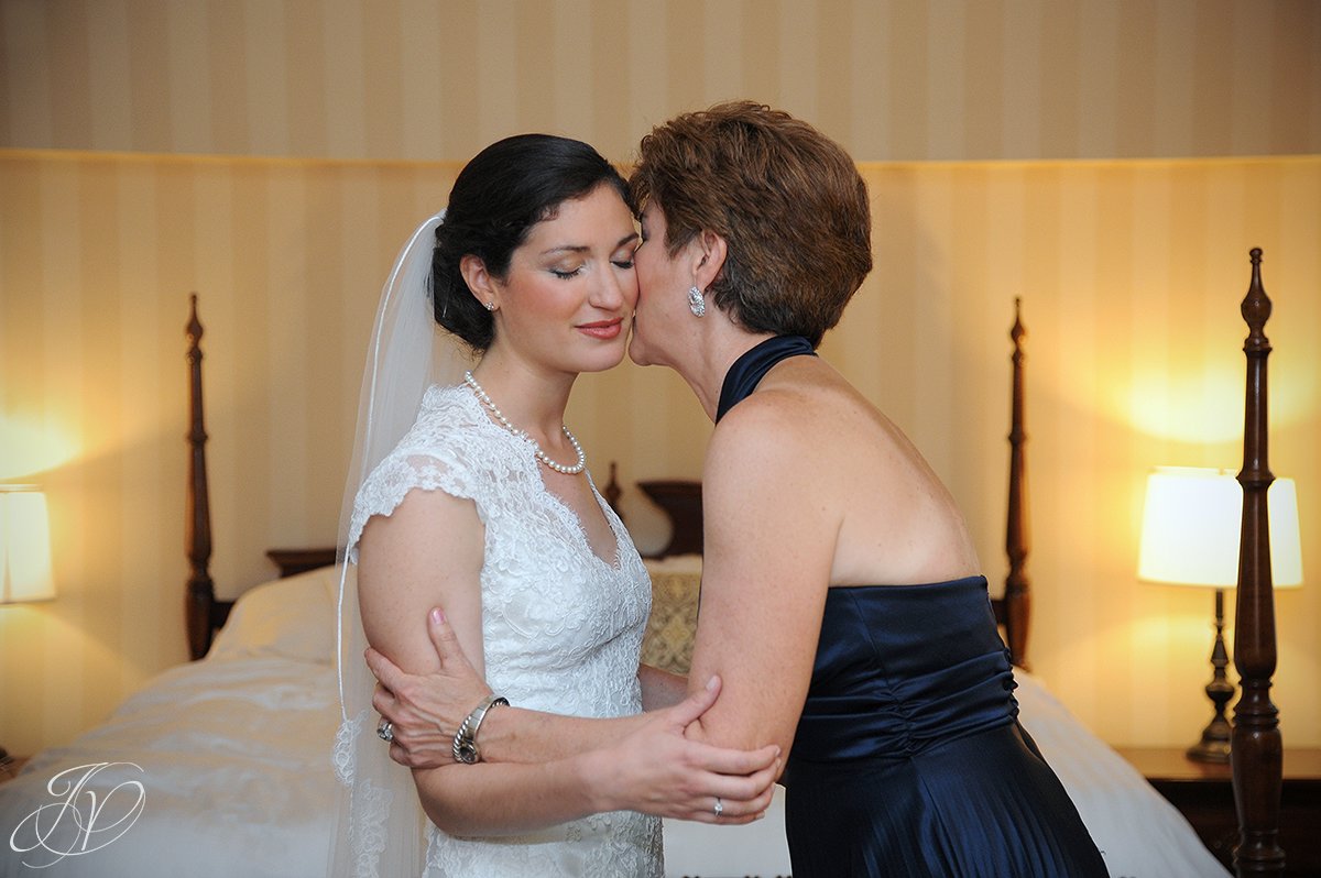 touching bride with mother photo, bride and mother portrait, bride and mother candid, Wedding at The Pruyn House, Albany Wedding Photographer