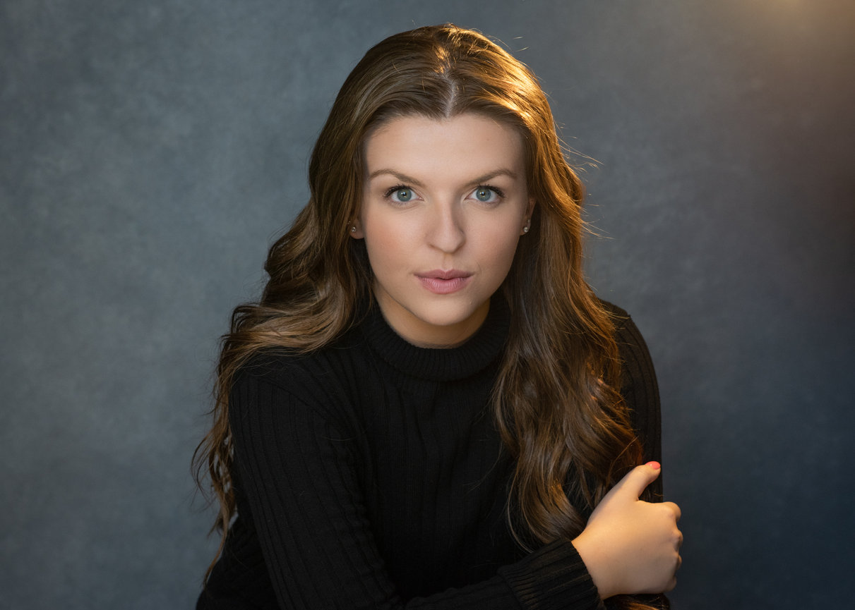 A refined headshot session image for Redlight Photography in Caldwell, ID, designed for professional online branding.