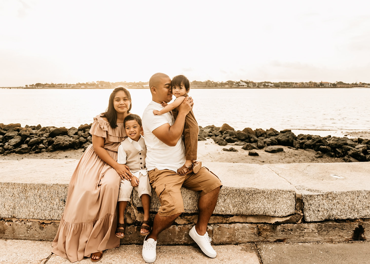 beautiful family of four portrait along the St. Augustine, Florida coast, Ryaphotos