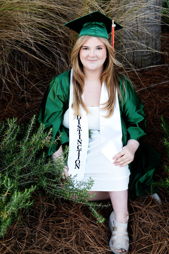 Senior girl in cap and gown