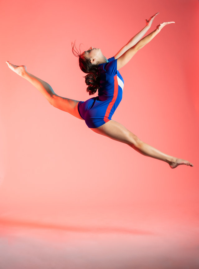 Charleston, SC studio dance portrait on a pink backdrop, image is created by Heather Johnson Photography