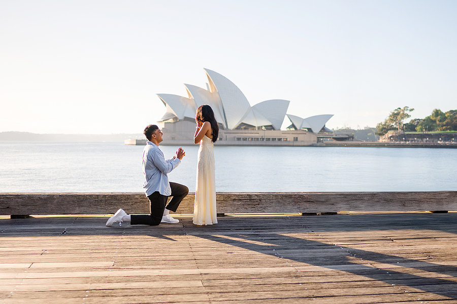 Portrait of a man proposing to a woman during a Sydney Opera House Photoshoot with Sarah Iris Photography.