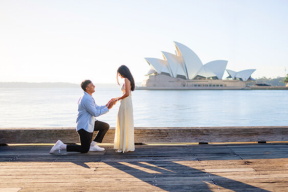 Portrait of a man proposing to a woman during a Sydney Opera House Photoshoot with Sarah Iris Photography.