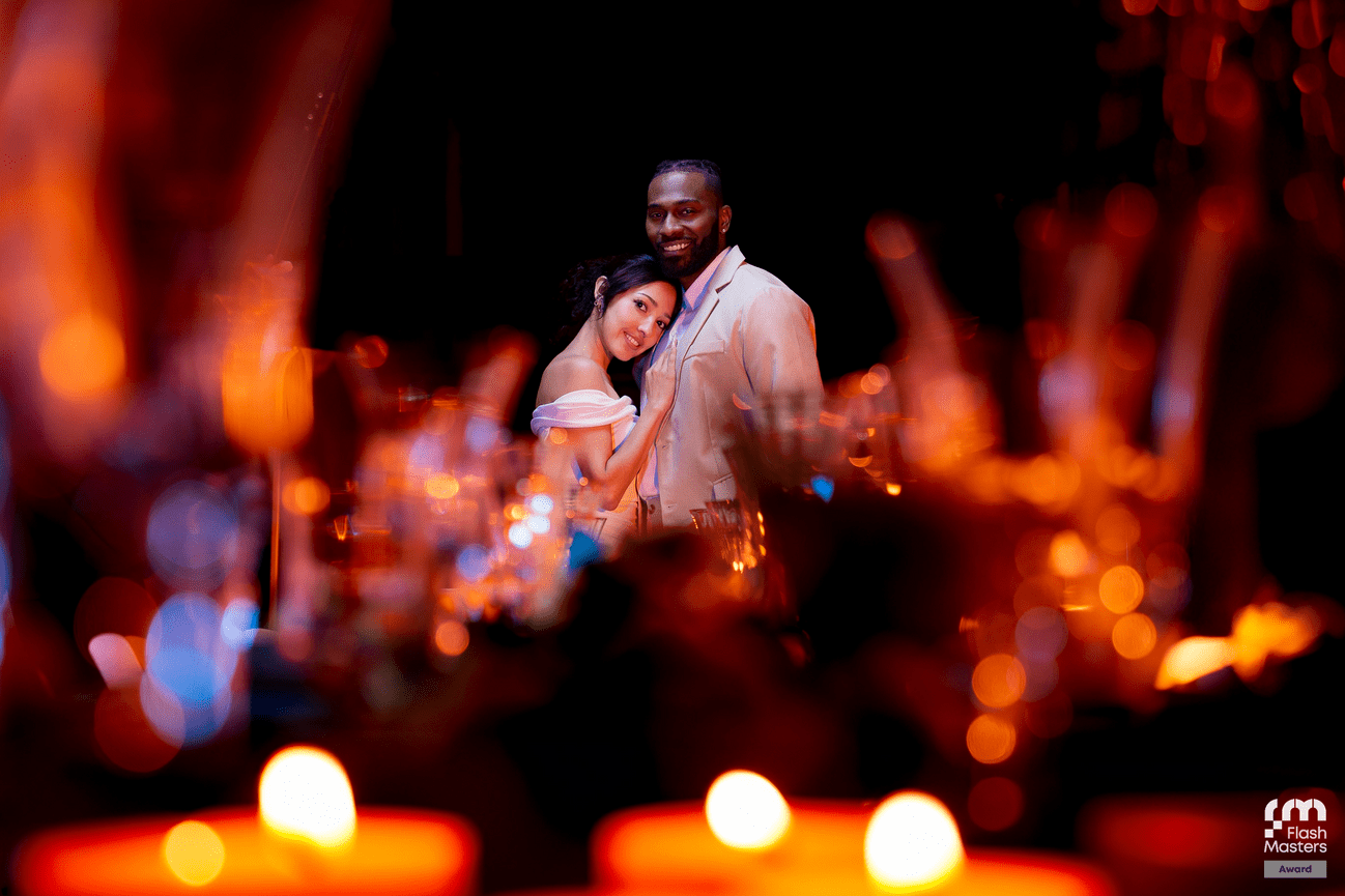 Couple embracing with a stylish abstract background
