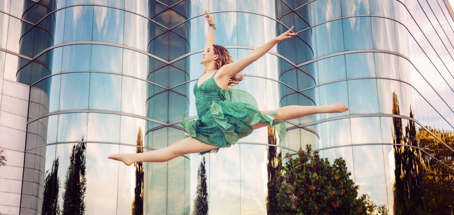 A dancer from commercial dance conservatory at OCSA leaps into her exciting senior year during her styled senior portrait session by Chele Jones Photography.!