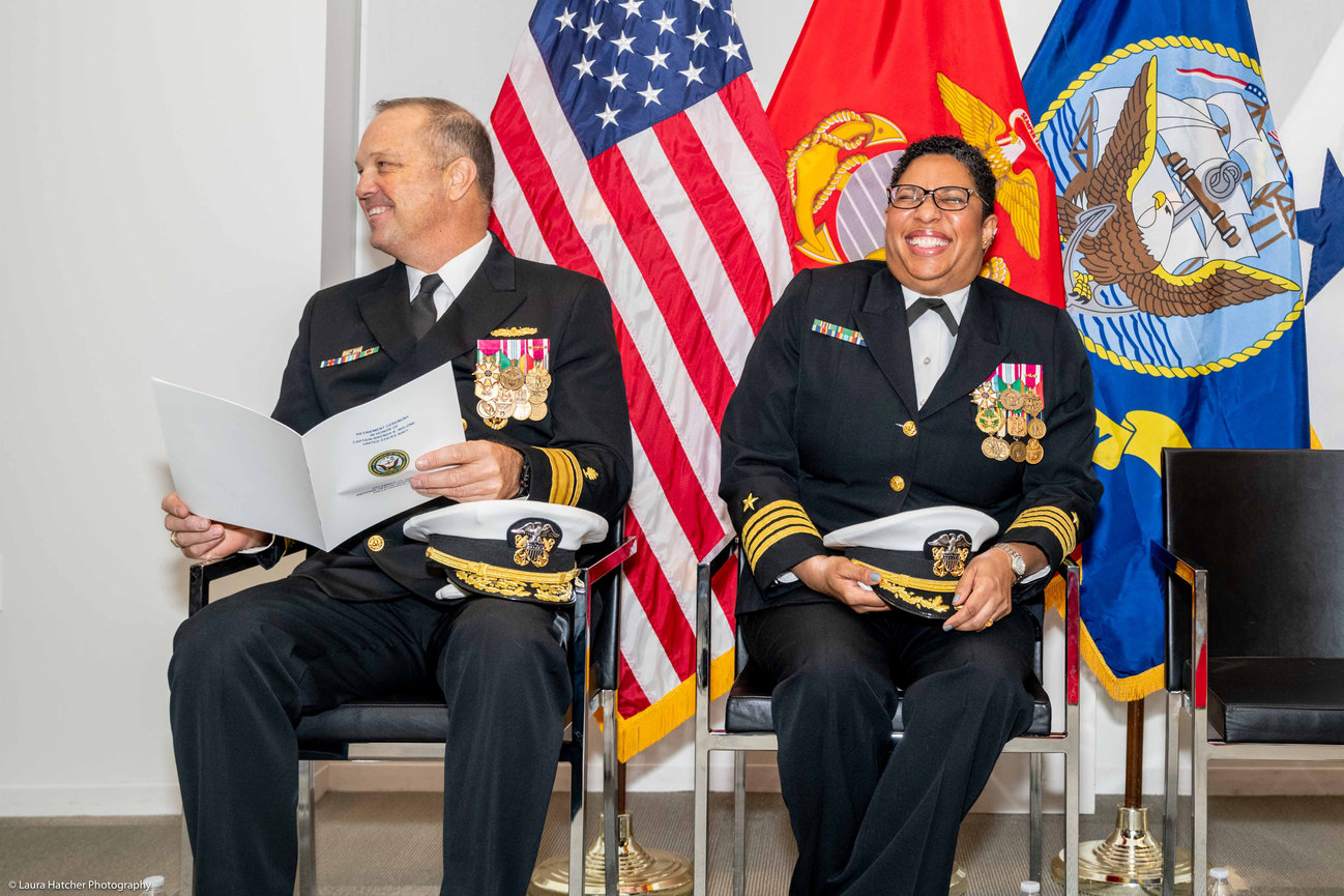 US Naval Officer laughing during her retirement ceremony