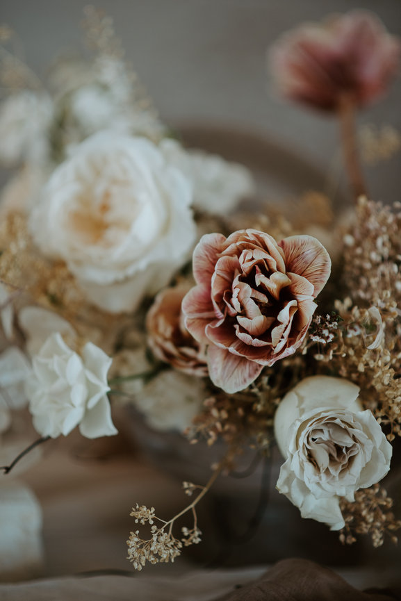 Tulip and garden roses in an assorted neutral palette