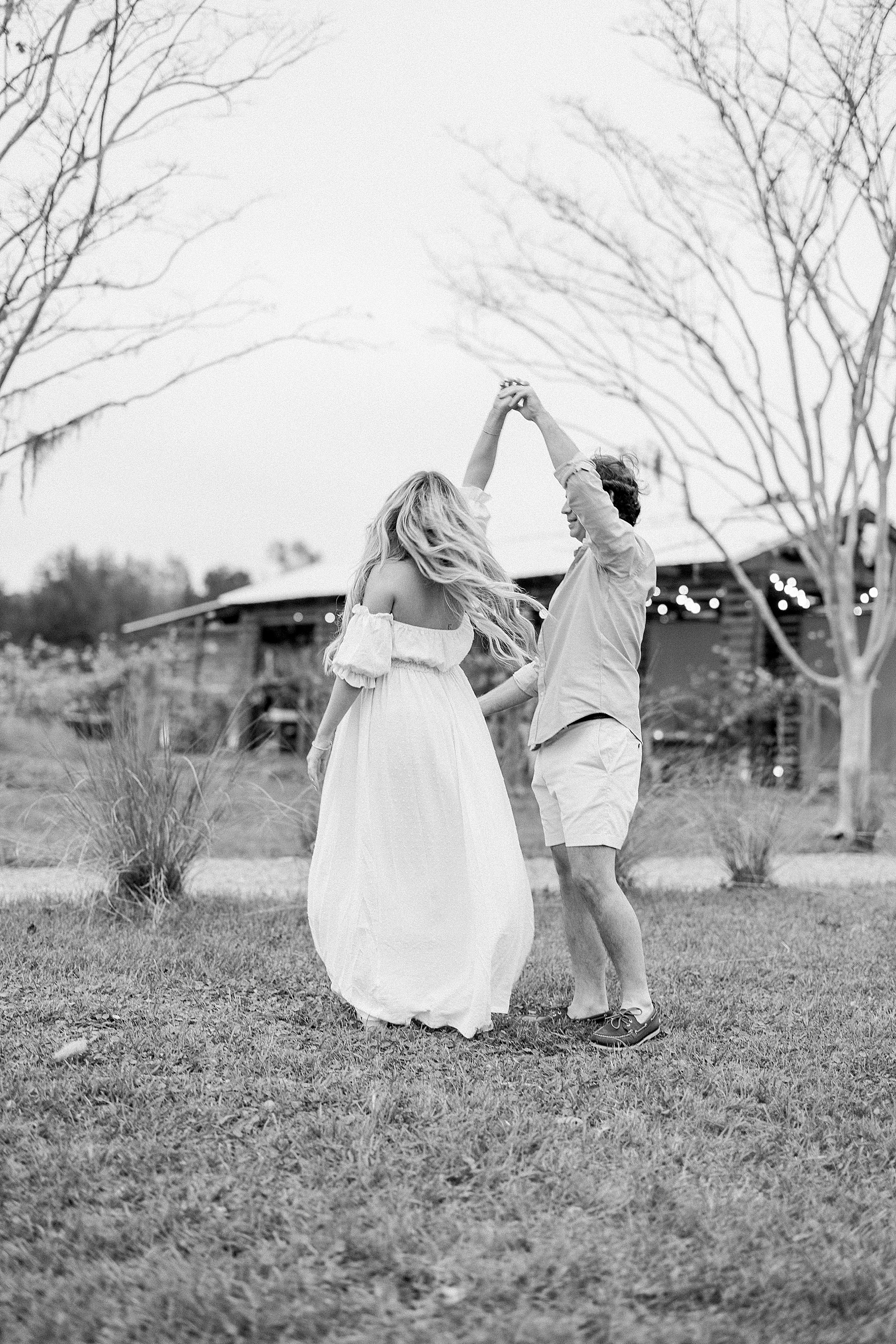 black and white photo of couple dancing in the vineyards at Congaree and Penn Farm Jacksonville