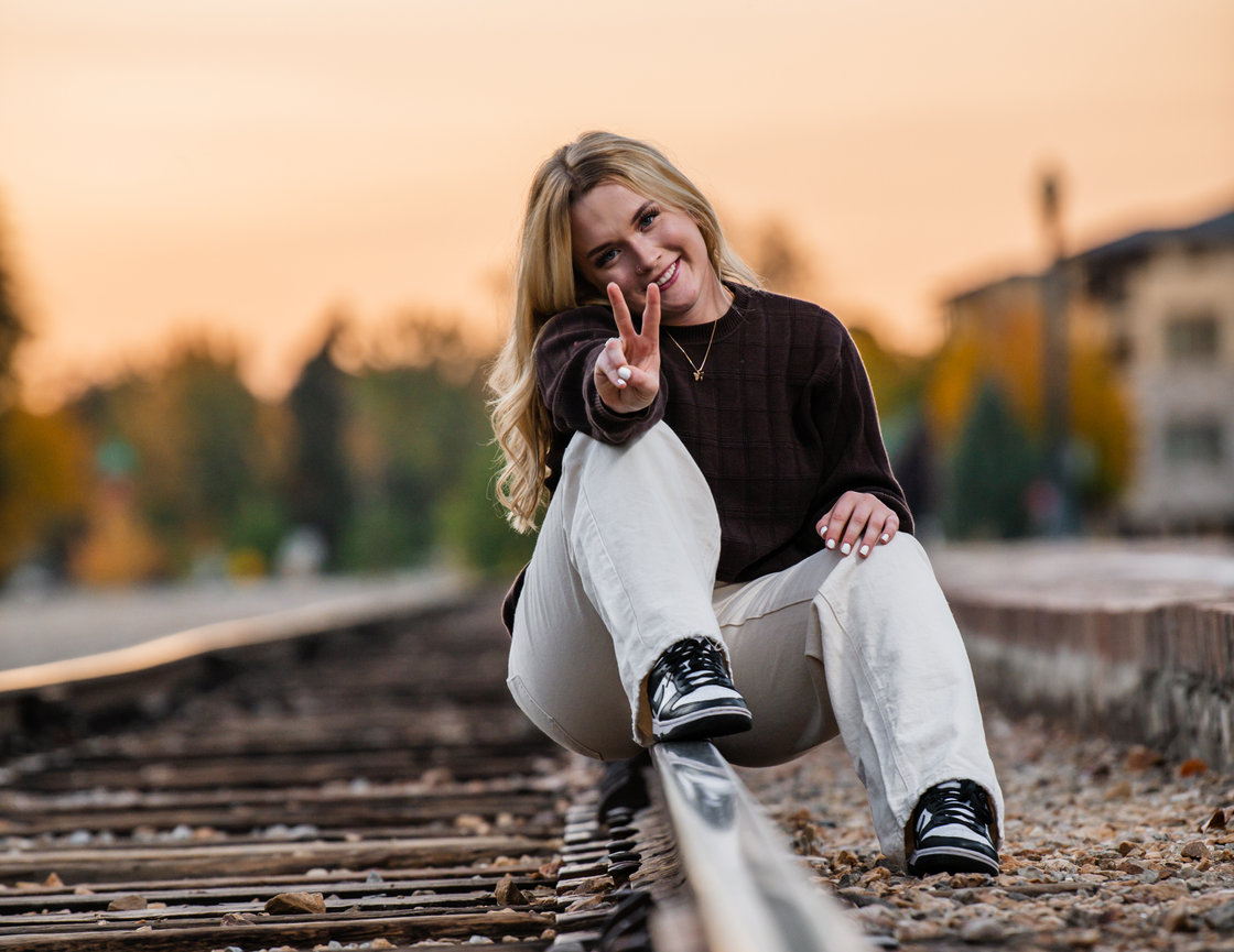 Senior year photos of girl in fall at the Boise Train Depot, Boise Idaho