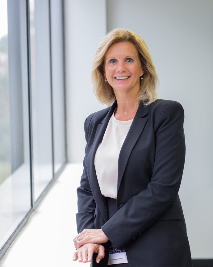 Professional business woman in corporate setting