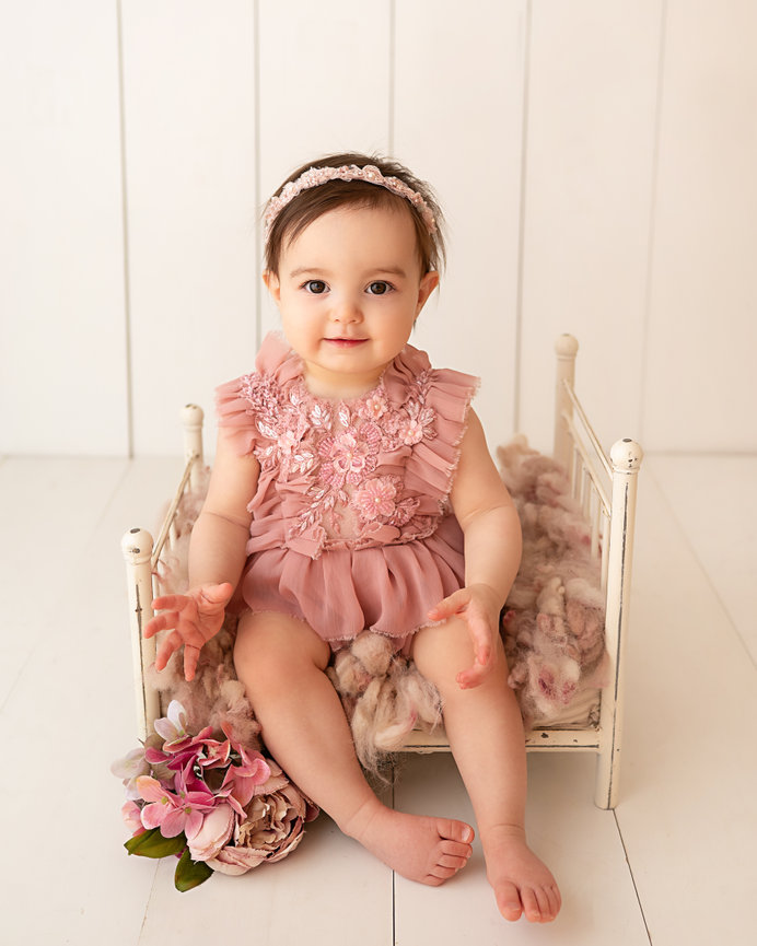 Calm and clean first birthday image taken in Sea Girt, NJ featuring baby and organic decor