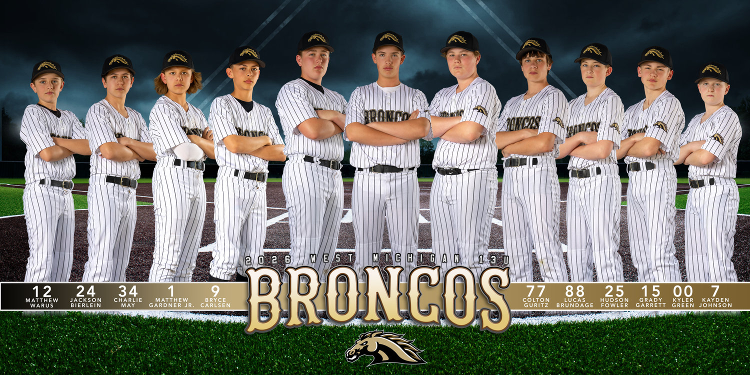 Broncos baseball team posing together in white uniforms on the field.