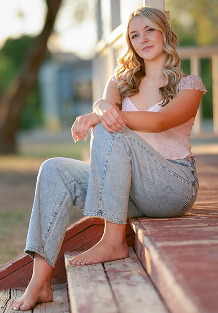 High school senior girl in relaxed sitting on porch Glendale, Arizona