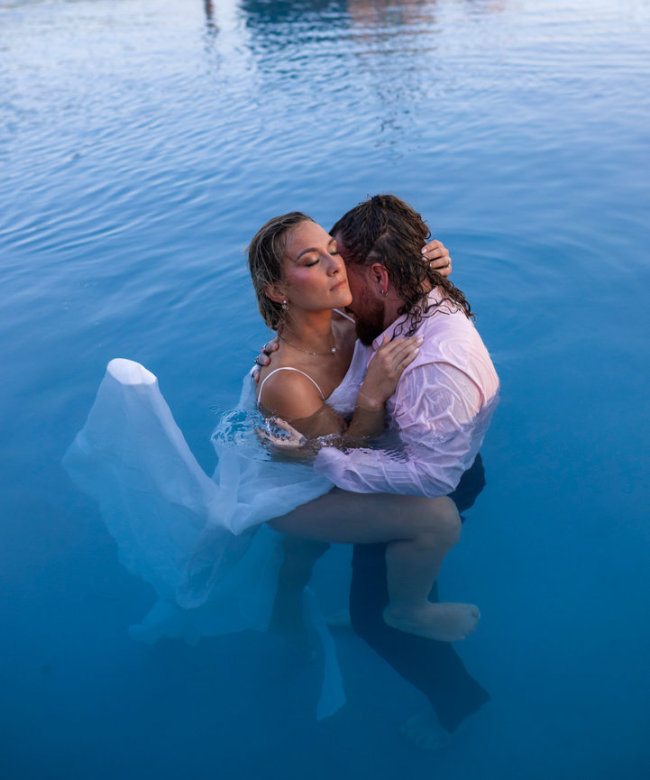 Couple embracing in a pool