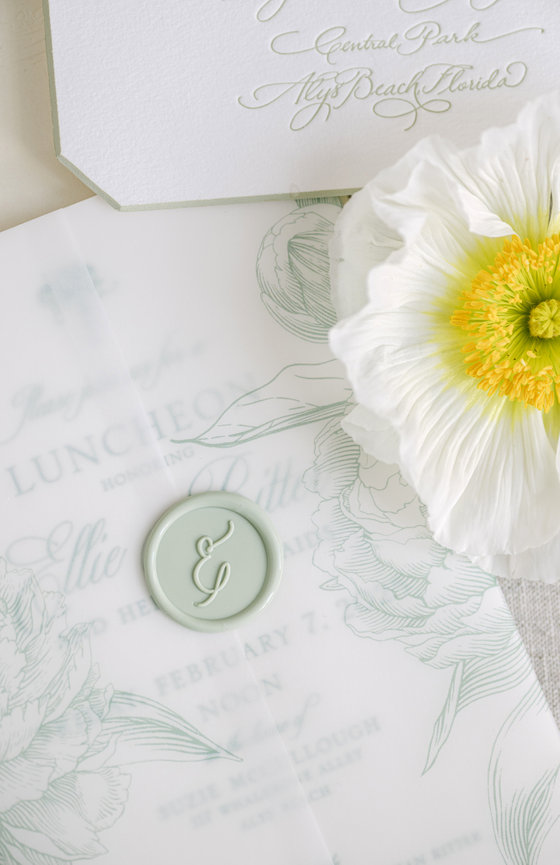 Custom wedding invitation details with monogrammed wax seal for Alys Beach wedding. Wedding photography by Heather Durham.