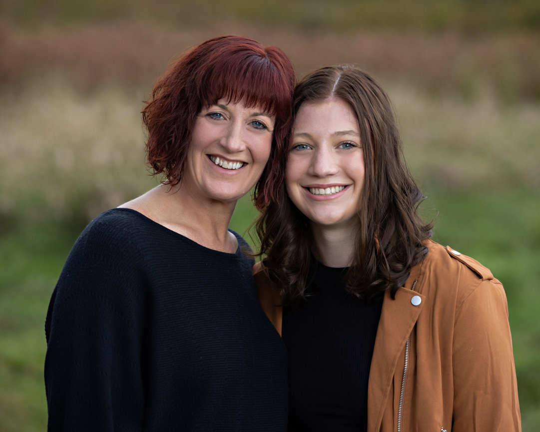 outdoor family portrait of mother and high school senior girl in field during the fall Mansfield ma