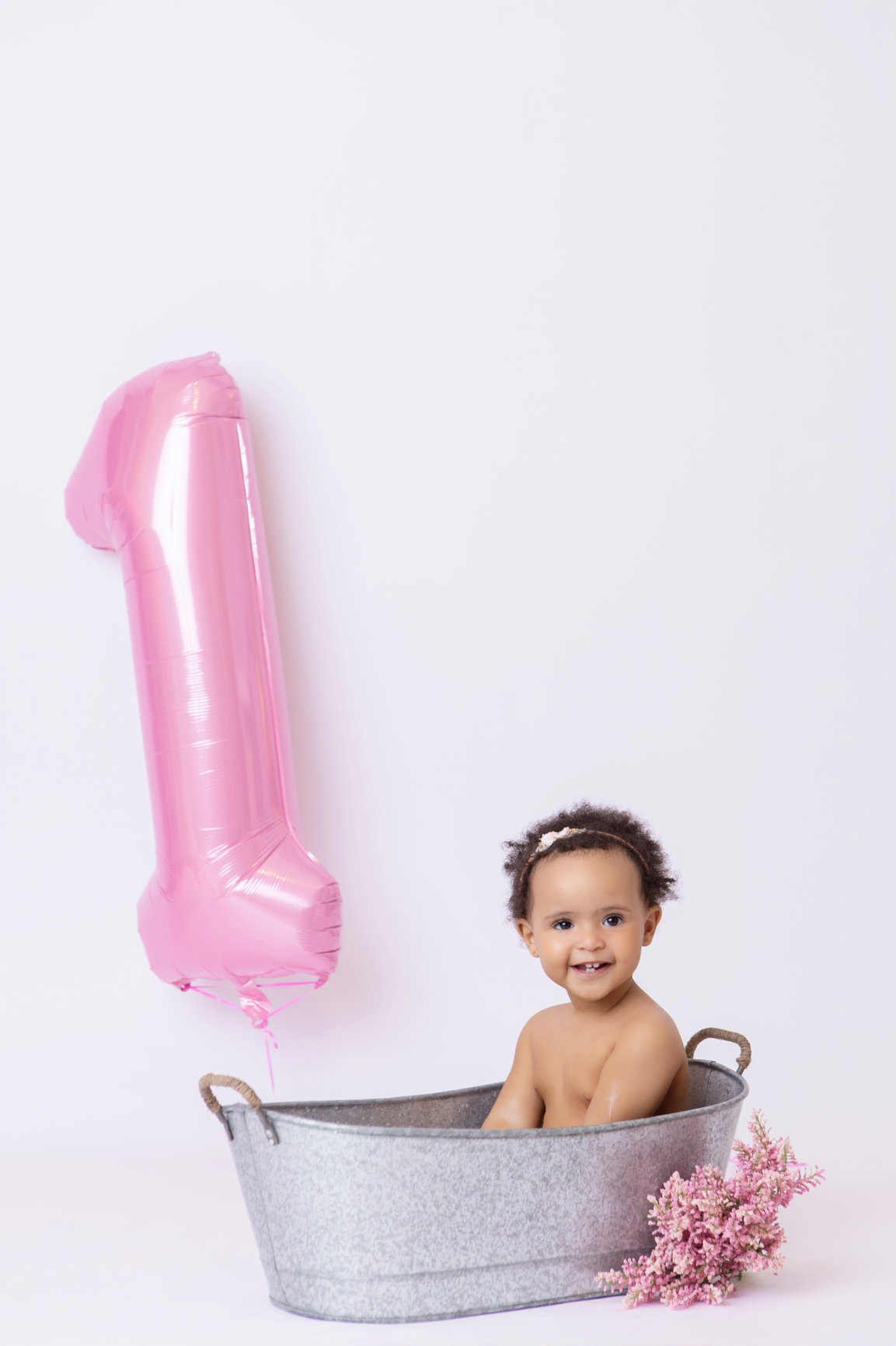 Calgary cake smash photography pink balloons tulle and bubbles first birthday session photo 22