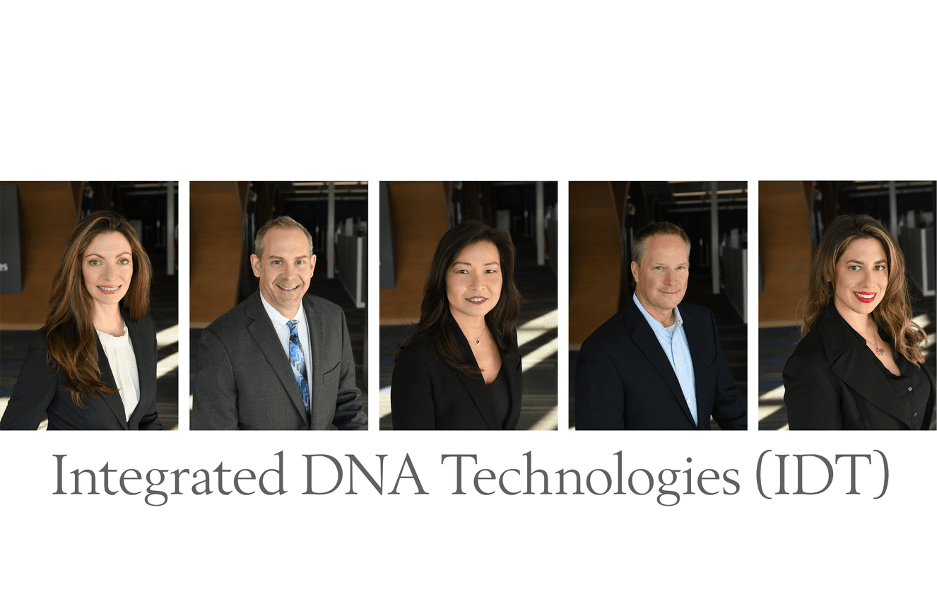 Five associate executives who convened in Cedar Rapids, Iowa for their company ribbon cutting ceremony.