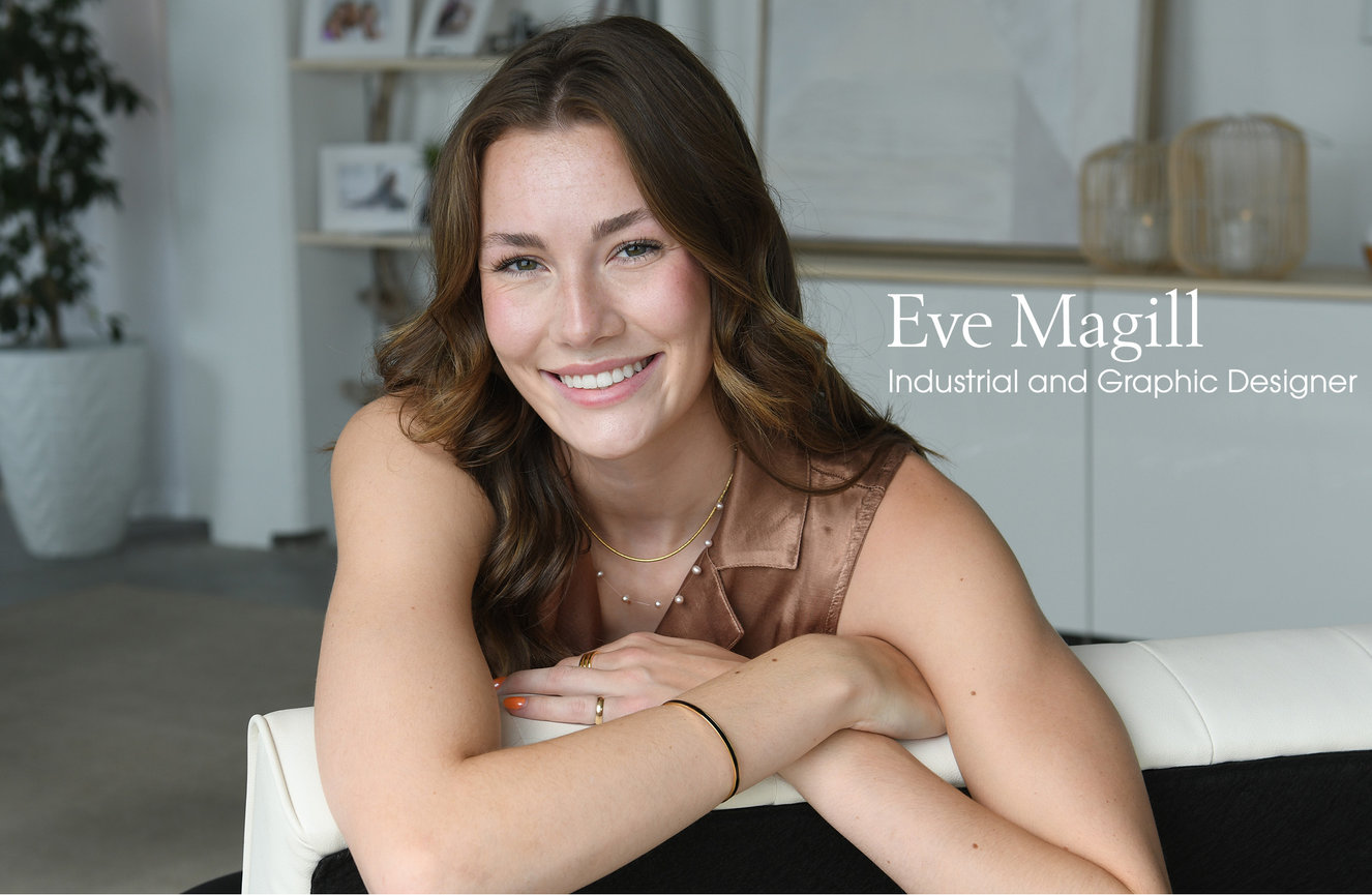 A female collage graduate casually leaning over a couch for her resume photo.