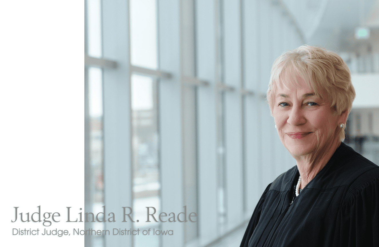 A female federal judge poses for her retirement photo in the Cedar Rapids US District Courthouse..