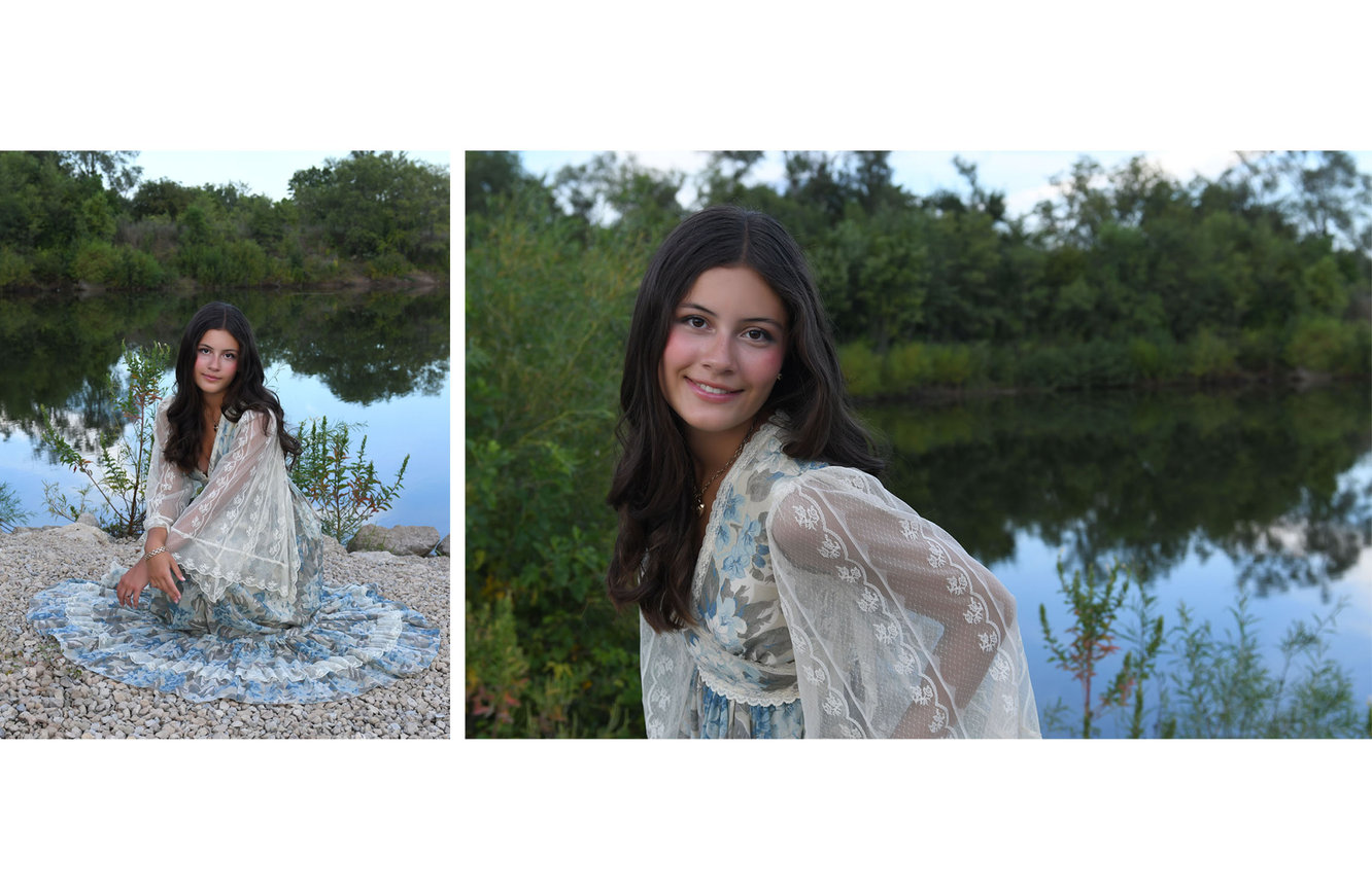 A high school senior gal near a lake while wearing her grandmothers floral dress during her photo session with Kliks Photography at The Fishery.