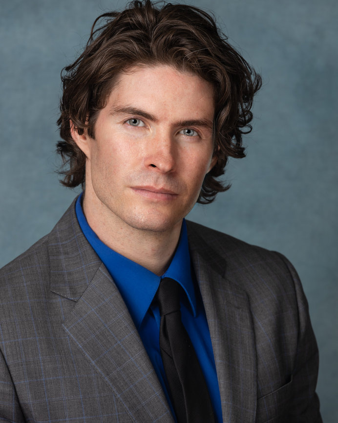 Professional male business headshot captured in Sarasota